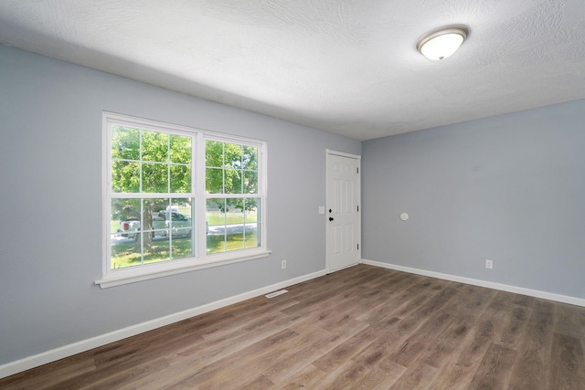 1020 Gretchen St, Nixa, MO 65714 - unfurnished room featuring wood finished floors and baseboards