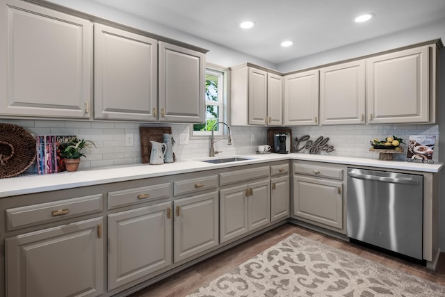 620 E Summit St, Bolivar, MO 65613 - kitchen with dishwasher, gray cabinets, decorative backsplash, and recessed lighting