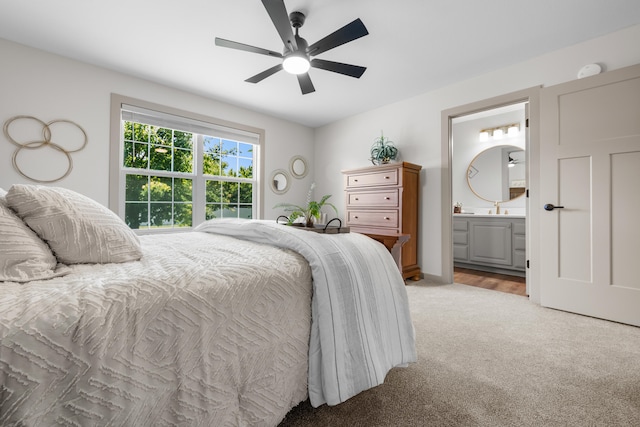 620 E Summit St, Bolivar, MO 65613 - bedroom with light carpet, ensuite bath, and a ceiling fan
