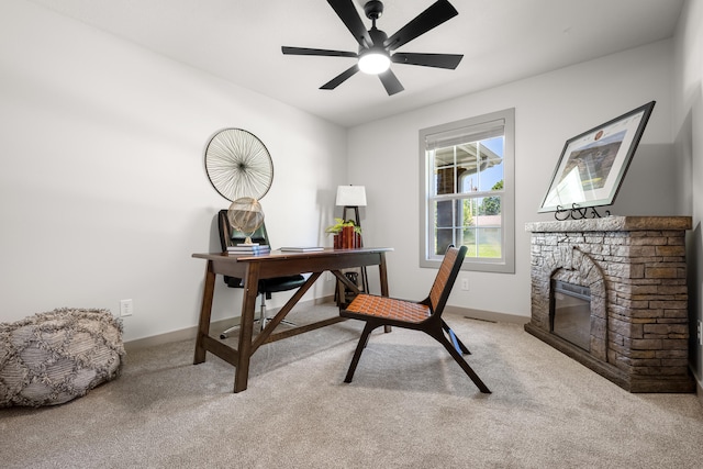 620 E Summit St, Bolivar, MO 65613 - carpeted office space with a stone fireplace and ceiling fan