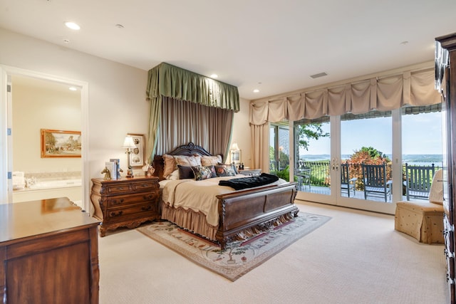 10 Patterson Ave, Branson, MO 65616 - bedroom with light carpet, access to exterior, recessed lighting, and ensuite bath