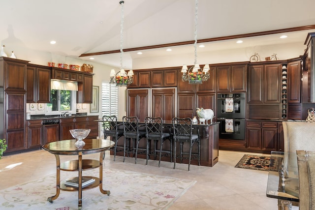 10 Patterson Ave, Branson, MO 65616 - kitchen with a chandelier, black appliances, recessed lighting, hanging light fixtures, and a kitchen island with sink