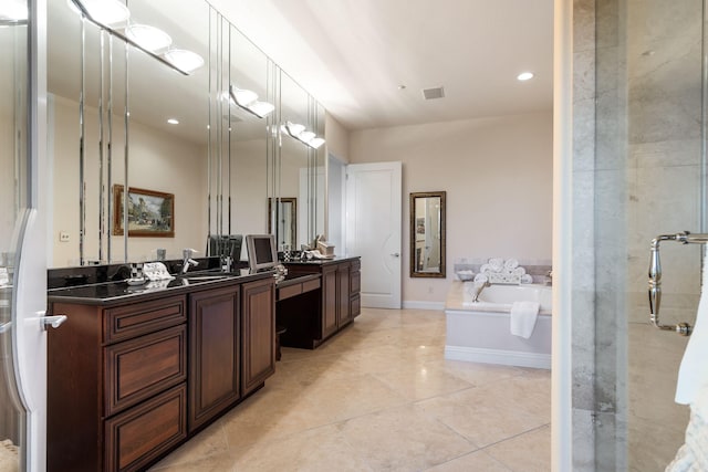 10 Patterson Ave, Branson, MO 65616 - bathroom featuring vanity, a bath, tile patterned flooring, an enclosed shower, and recessed lighting