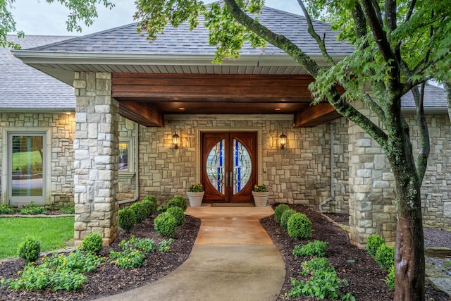 10 Patterson Ave, Branson, MO 65616 - view of exterior entry with roof with shingles and stone siding