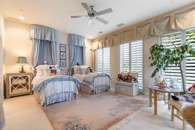 10 Patterson Ave, Branson, MO 65616 - carpeted bedroom with multiple windows and a ceiling fan