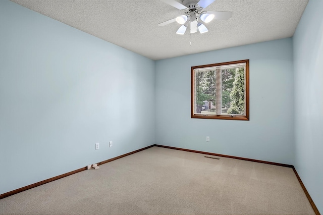 2812 E Linwood St, Springfield, MO 65804 - carpeted spare room with a textured ceiling and ceiling fan