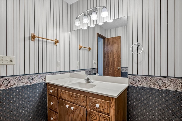 2812 E Linwood St, Springfield, MO 65804 - bathroom featuring wallpapered walls and vanity