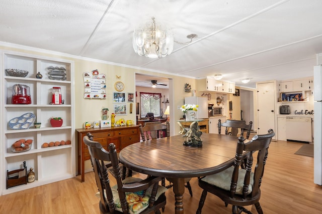 6665 State Highway 173, Cape Fair, MO 65624 - dining area featuring a chandelier, light wood-style flooring, ceiling fan, and crown molding