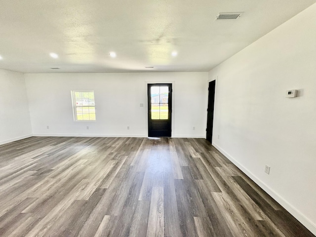 401 E 17th St, Lockwood, MO 65682 - spare room featuring dark wood-style floors and recessed lighting