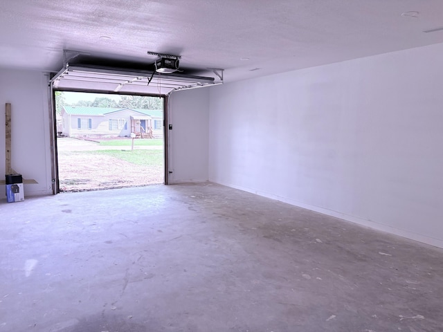 401 E 17th St, Lockwood, MO 65682 - garage featuring a garage door opener