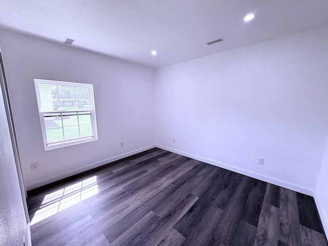 401 E 17th St, Lockwood, MO 65682 - spare room with dark wood-style flooring and recessed lighting