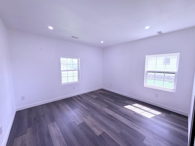401 E 17th St, Lockwood, MO 65682 - unfurnished room featuring dark wood-style floors and recessed lighting