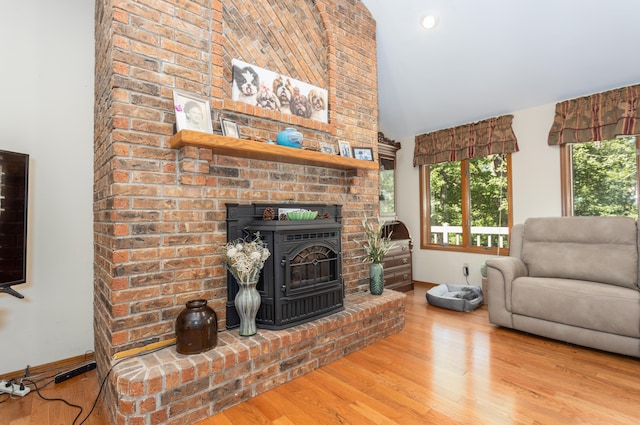 6337 S Farm Road 31, Billings, MO 65610 - living room featuring wood finished floors and high vaulted ceiling