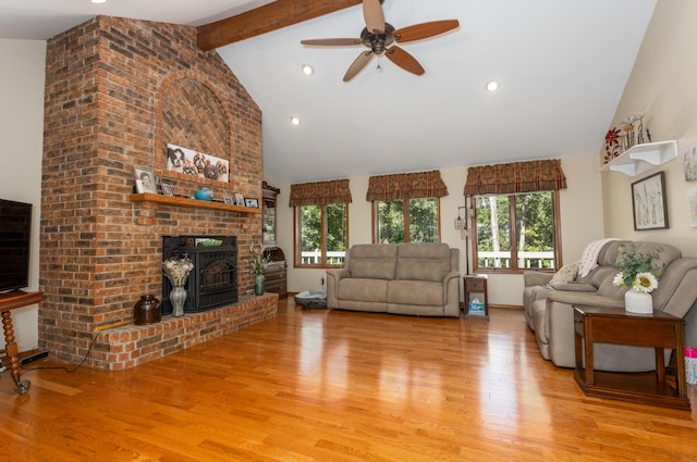 6337 S Farm Road 31, Billings, MO 65610 - living room featuring healthy amount of natural light, light wood-type flooring, ceiling fan, high vaulted ceiling, and beam ceiling