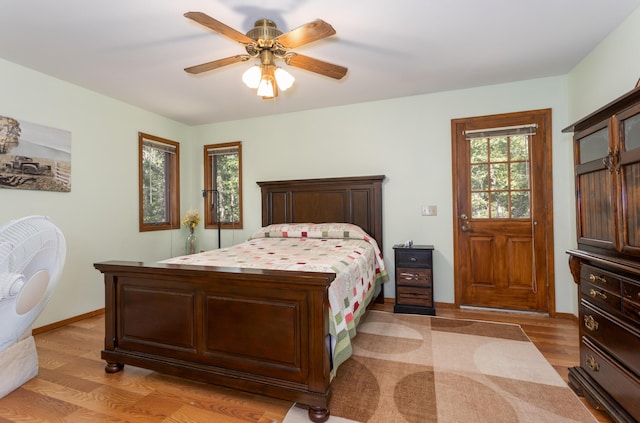 6337 S Farm Road 31, Billings, MO 65610 - bedroom featuring light wood finished floors and a ceiling fan