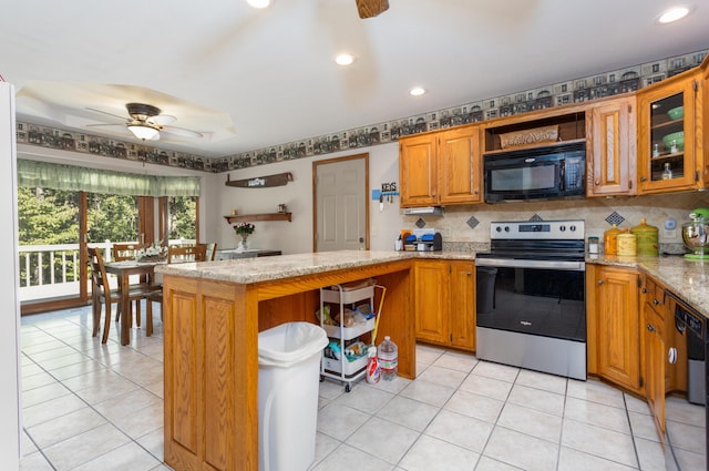 6337 S Farm Road 31, Billings, MO 65610 - kitchen featuring stainless steel electric range oven, black microwave, open shelves, a ceiling fan, and a kitchen island