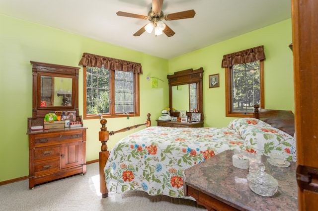 6337 S Farm Road 31, Billings, MO 65610 - carpeted bedroom featuring multiple windows and a ceiling fan