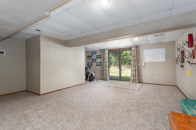 6337 S Farm Road 31, Billings, MO 65610 - below grade area with carpet flooring, a drop ceiling, and wooden walls