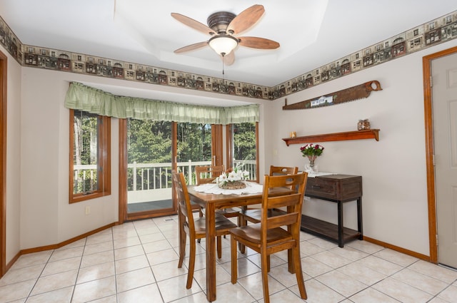 6337 S Farm Road 31, Billings, MO 65610 - dining room with a ceiling fan, light tile patterned floors, and a raised ceiling