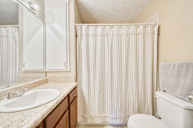 3477 W Broadmoor Ct, Springfield, MO 65807 - full bathroom featuring a textured ceiling, vanity, tile patterned floors, and curtained shower