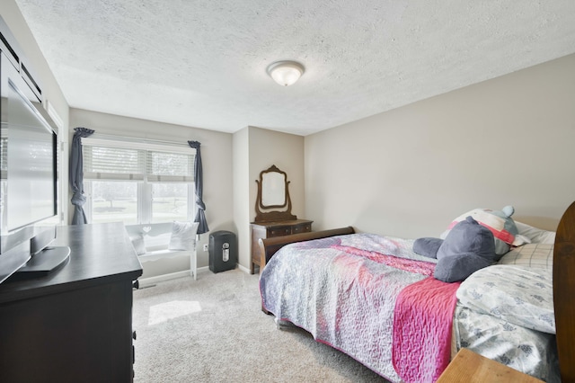 3477 W Broadmoor Ct, Springfield, MO 65807 - carpeted bedroom featuring a textured ceiling and baseboards