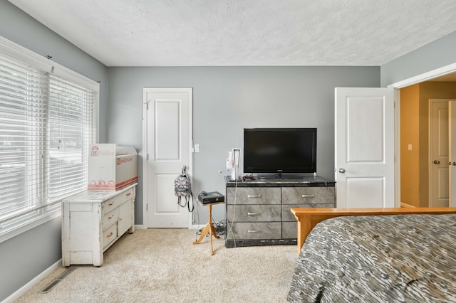 3477 W Broadmoor Ct, Springfield, MO 65807 - bedroom featuring a textured ceiling and carpet