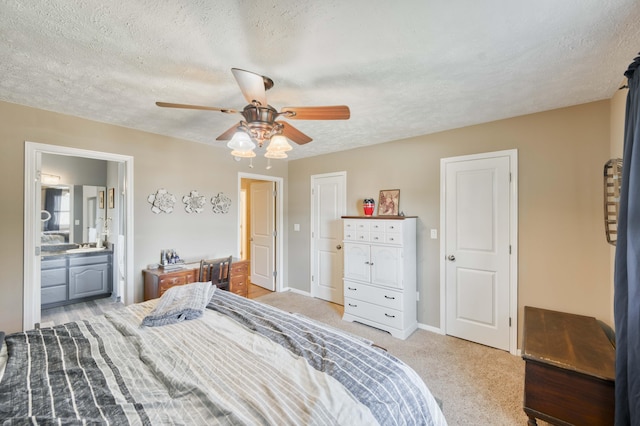 3477 W Broadmoor Ct, Springfield, MO 65807 - bedroom featuring a textured ceiling, light colored carpet, ceiling fan, and ensuite bathroom