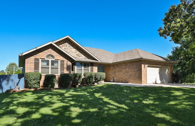 360 Durango Ln, Billings, MO 65610 - ranch-style house with brick siding, an attached garage, a front yard, and concrete driveway