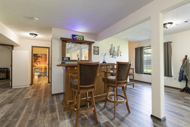 360 Durango Ln, Billings, MO 65610 - indoor dry bar with dark wood finished floors and baseboards