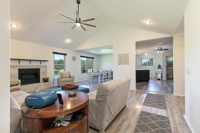 360 Durango Ln, Billings, MO 65610 - living room with a ceiling fan, wood finished floors, lofted ceiling, a premium fireplace, and recessed lighting