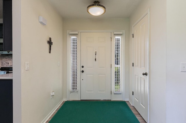 360 Durango Ln, Billings, MO 65610 - foyer featuring baseboards and dark wood-type flooring