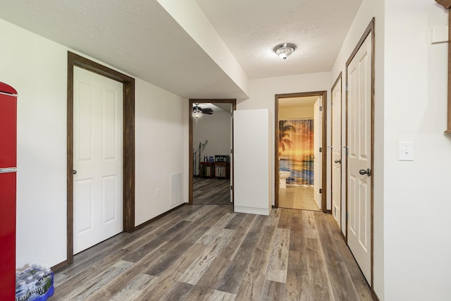 360 Durango Ln, Billings, MO 65610 - hallway with wood finished floors and a textured ceiling