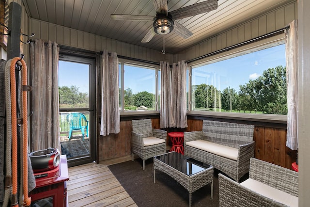 360 Durango Ln, Billings, MO 65610 - sunroom with hardwood / wood-style floors, wood walls, and a deck