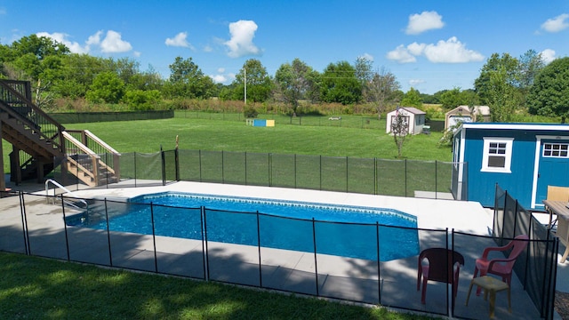 360 Durango Ln, Billings, MO 65610 - view of pool featuring stairway, a storage shed, and a fenced backyard