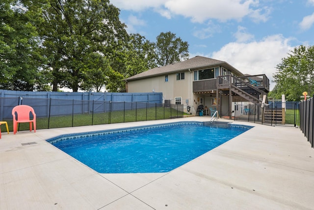 360 Durango Ln, Billings, MO 65610 - view of swimming pool with stairs, a fenced backyard, a patio, and a deck