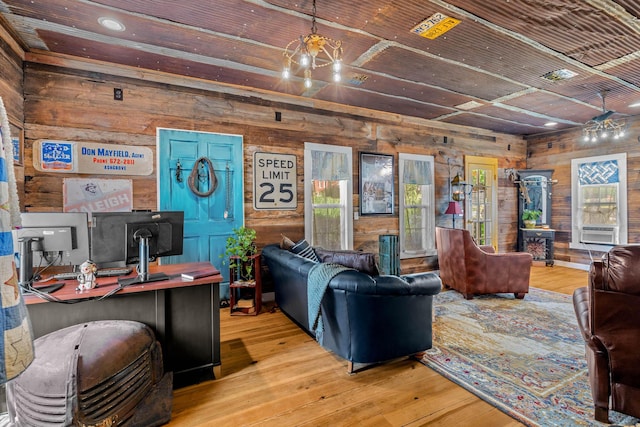 208 E Washington St, Pierce City, MO 65723 - living area featuring wooden walls and wood-type flooring