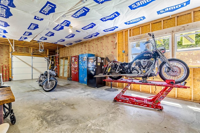 208 E Washington St, Pierce City, MO 65723 - garage featuring a garage door opener
