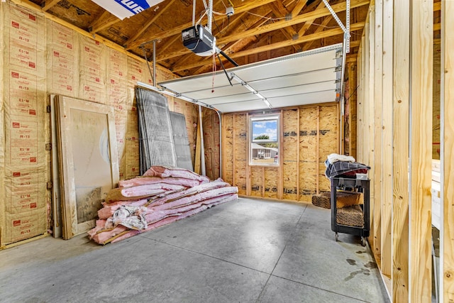 208 E Washington St, Pierce City, MO 65723 - garage featuring a garage door opener