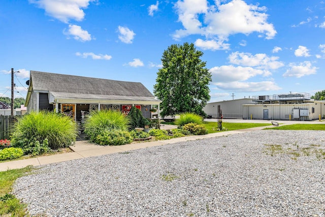 208 E Washington St, Pierce City, MO 65723 - view of front of property with a shingled roof