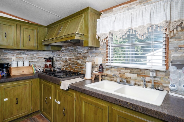 1410 S Elizabeth Rd, Stockton, MO 65785 - kitchen featuring black stovetop, decorative backsplash, dark countertops, and custom range hood