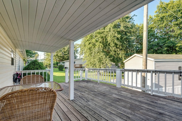 1410 S Elizabeth Rd, Stockton, MO 65785 - wooden terrace with a yard and a shed