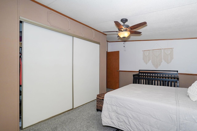 1410 S Elizabeth Rd, Stockton, MO 65785 - carpeted bedroom with a closet and a ceiling fan