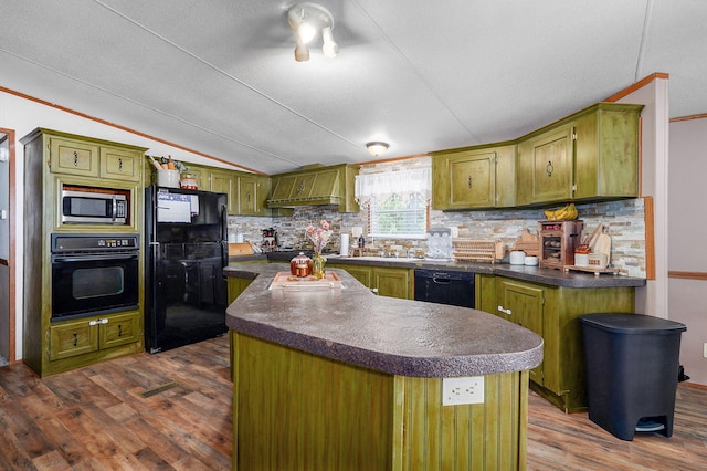 1410 S Elizabeth Rd, Stockton, MO 65785 - kitchen with black appliances, green cabinetry, dark wood-type flooring, dark countertops, and decorative backsplash