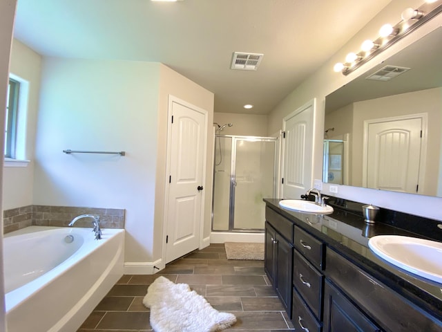 1113 Chesterfield Dr, Webb City, MO 64870 - full bath featuring a stall shower, double vanity, and a garden tub