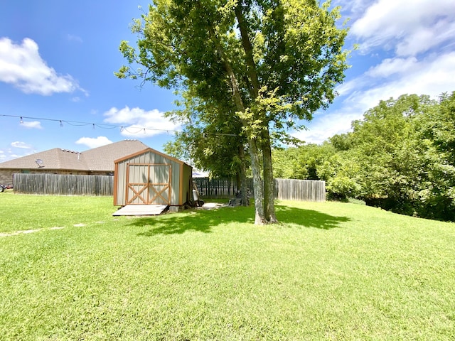 1113 Chesterfield Dr, Webb City, MO 64870 - fenced backyard with a storage shed