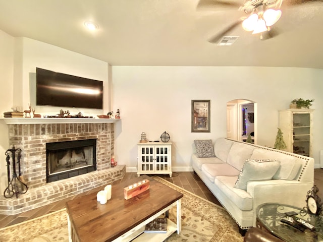 1113 Chesterfield Dr, Webb City, MO 64870 - living room with ceiling fan, arched walkways, a fireplace, and recessed lighting