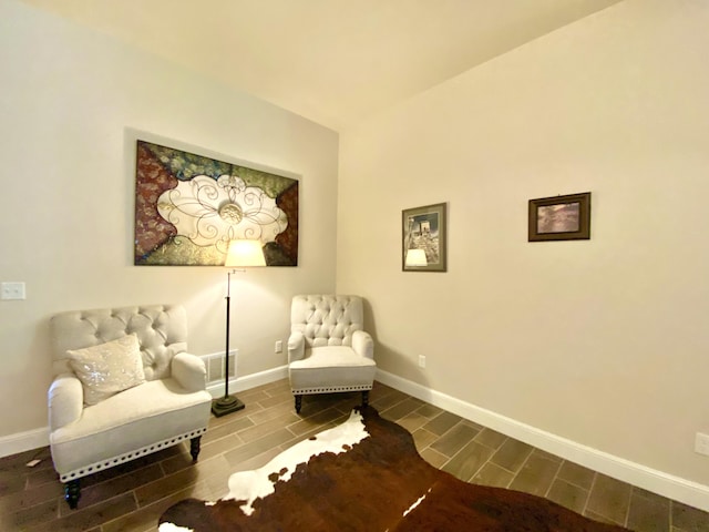 1113 Chesterfield Dr, Webb City, MO 64870 - living area with baseboards and wood finish floors