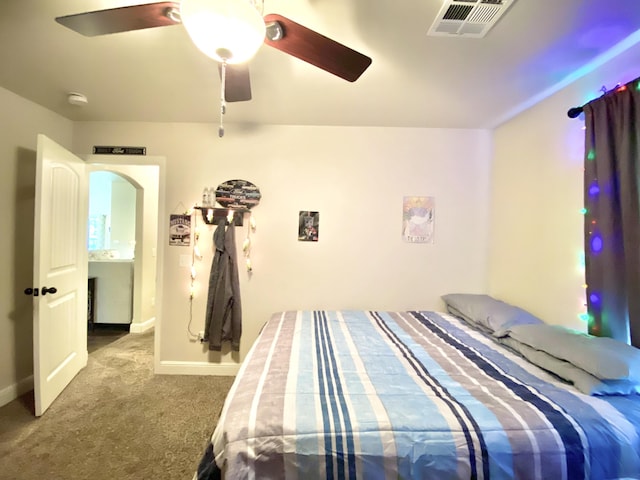 1113 Chesterfield Dr, Webb City, MO 64870 - carpeted bedroom featuring a ceiling fan and arched walkways
