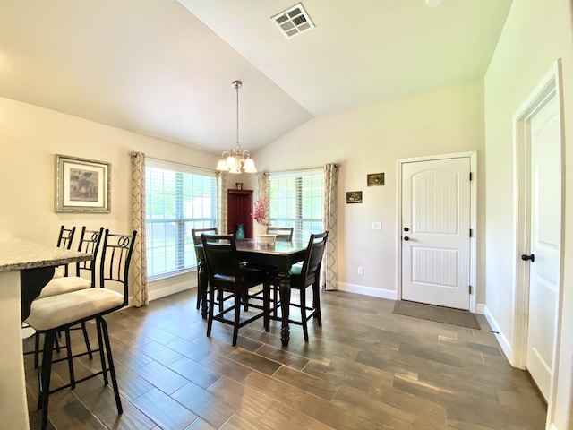 1113 Chesterfield Dr, Webb City, MO 64870 - dining area with vaulted ceiling, a chandelier, and dark wood finished floors