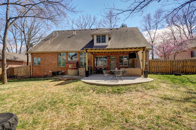 3931 E Stanford St, Springfield, MO 65809 - rear view of house featuring a pergola, brick siding, a fenced backyard, a patio area, and roof with shingles